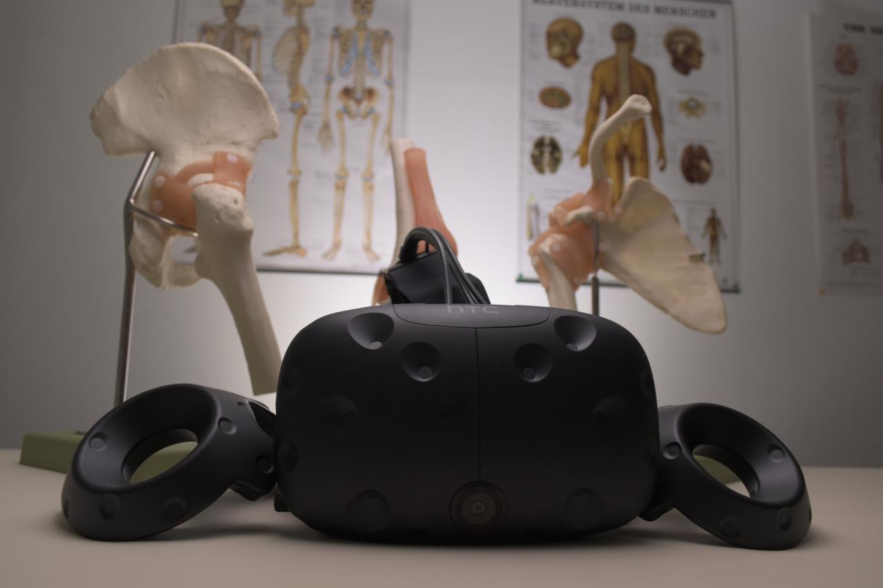 VR set with skeleton diagram in background