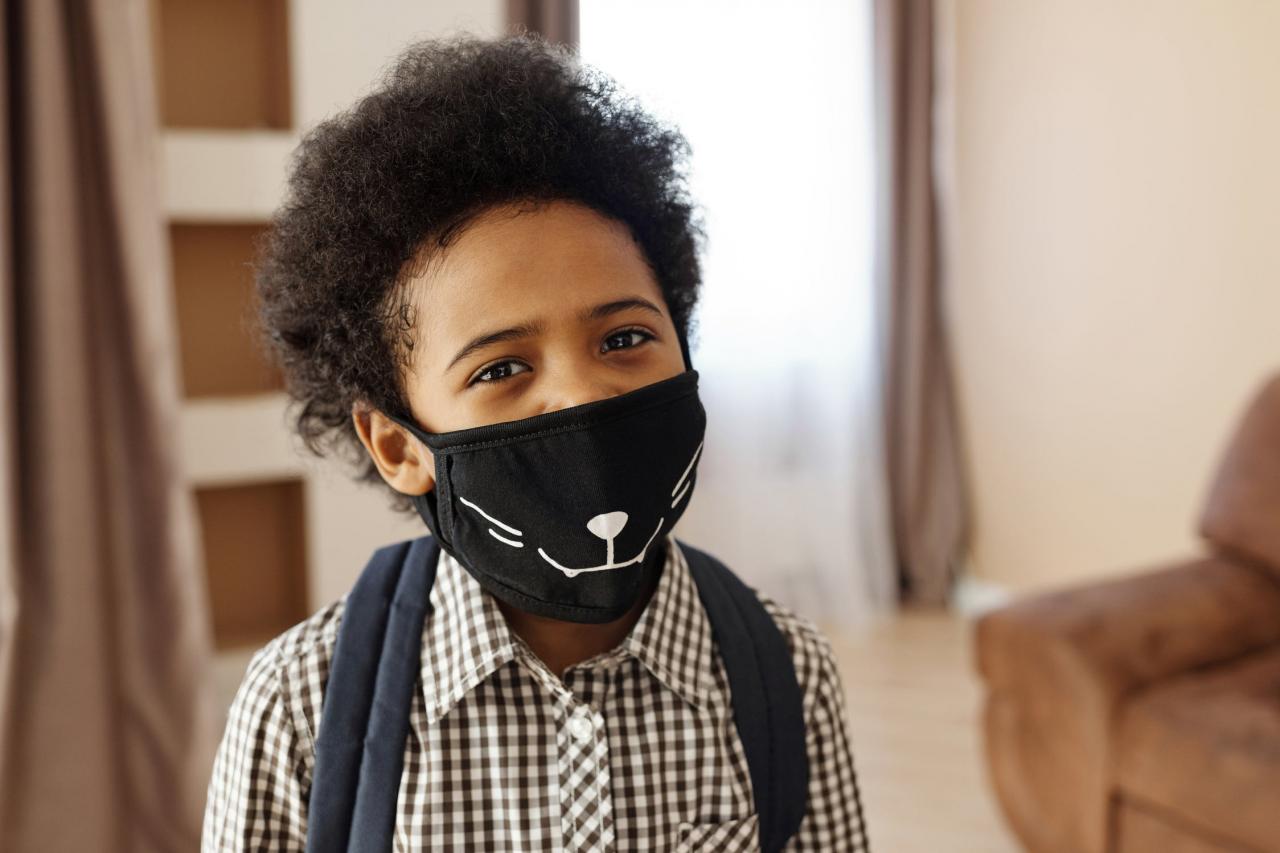 child wearing a mask