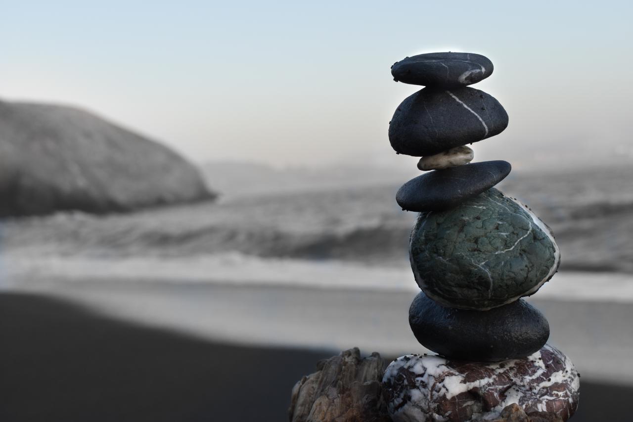 a seascape with the focus on a small pile of rocks