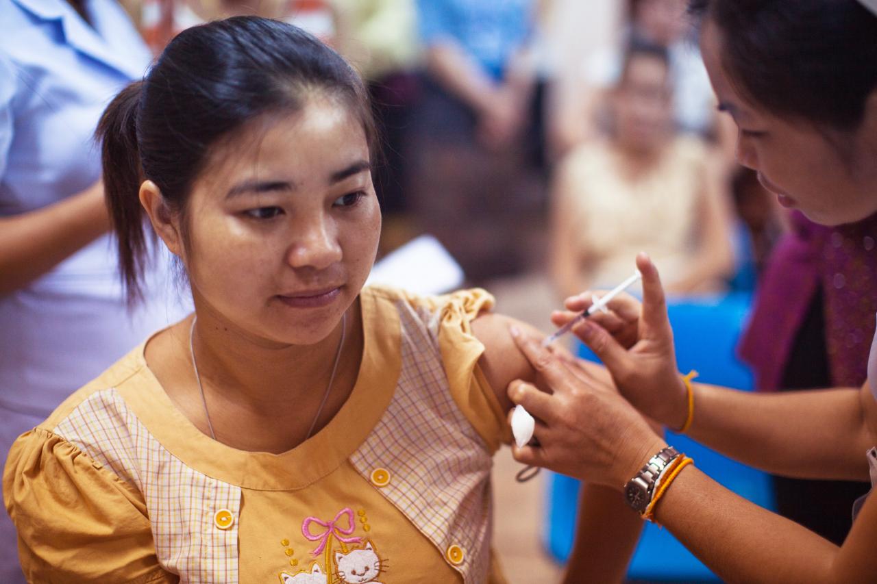 Teen receiving injection of COVID-19 Vaccine. Photo by CDC on Unsplash