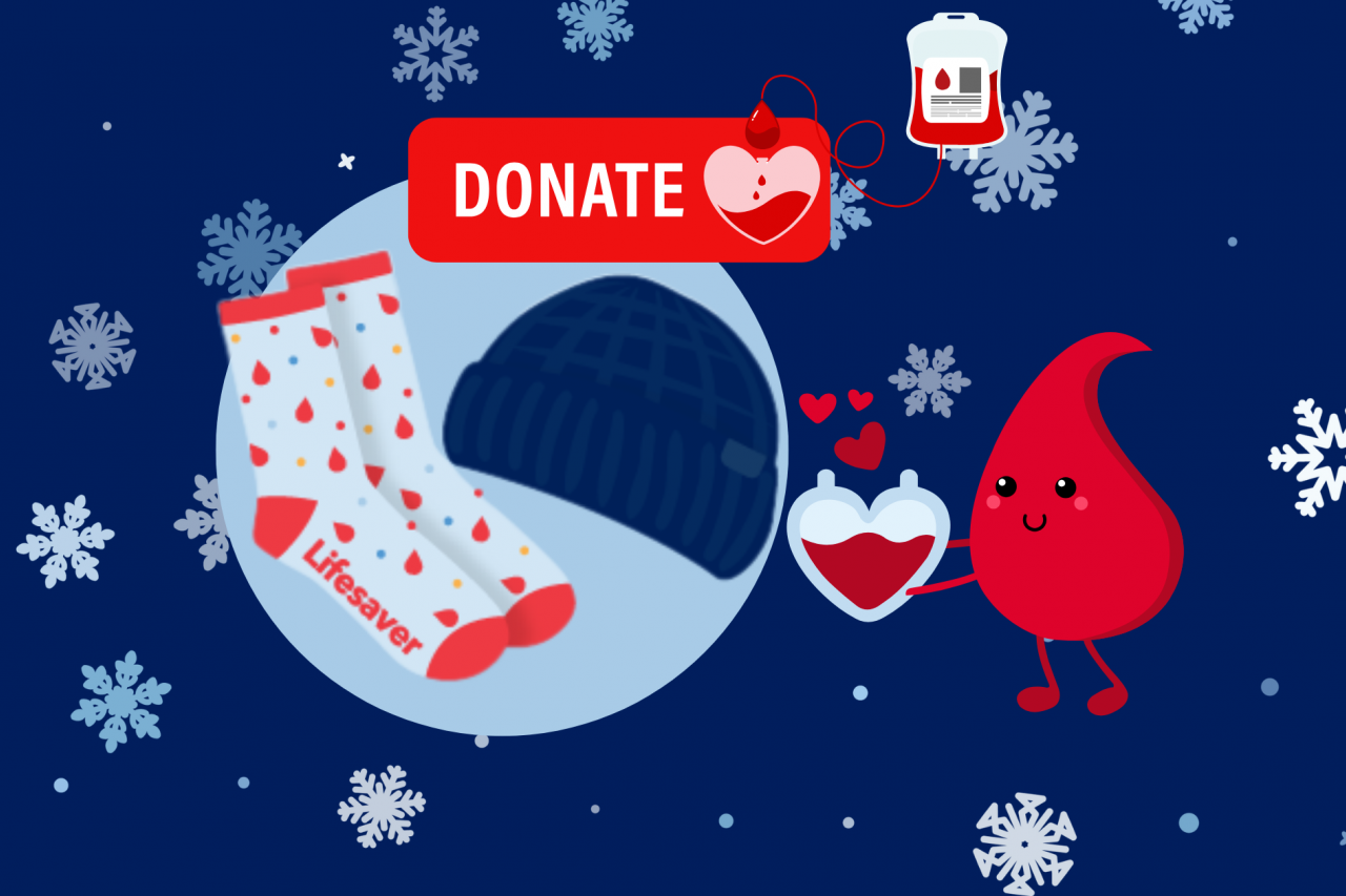 Illustration of anthropomorphic blood drop holding a heart-shaped blood bag on the right side of a pair of fuzzy socks that say "Lifesaver" and a winter hat, with an illustration of a blood bag filling a heart with blood leading to a "donate" sign above it, all on a background of falling snowflakes of different sizes.
