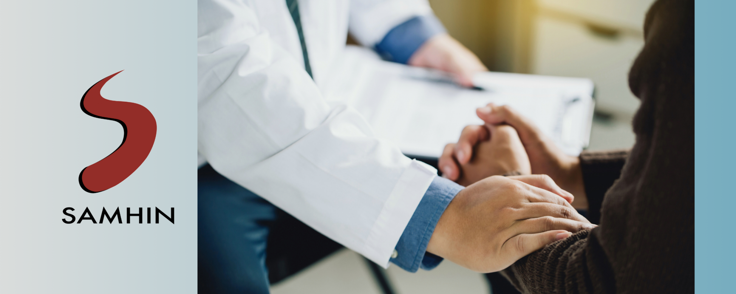 zoom in photo of a psychiatrist comforting a patient