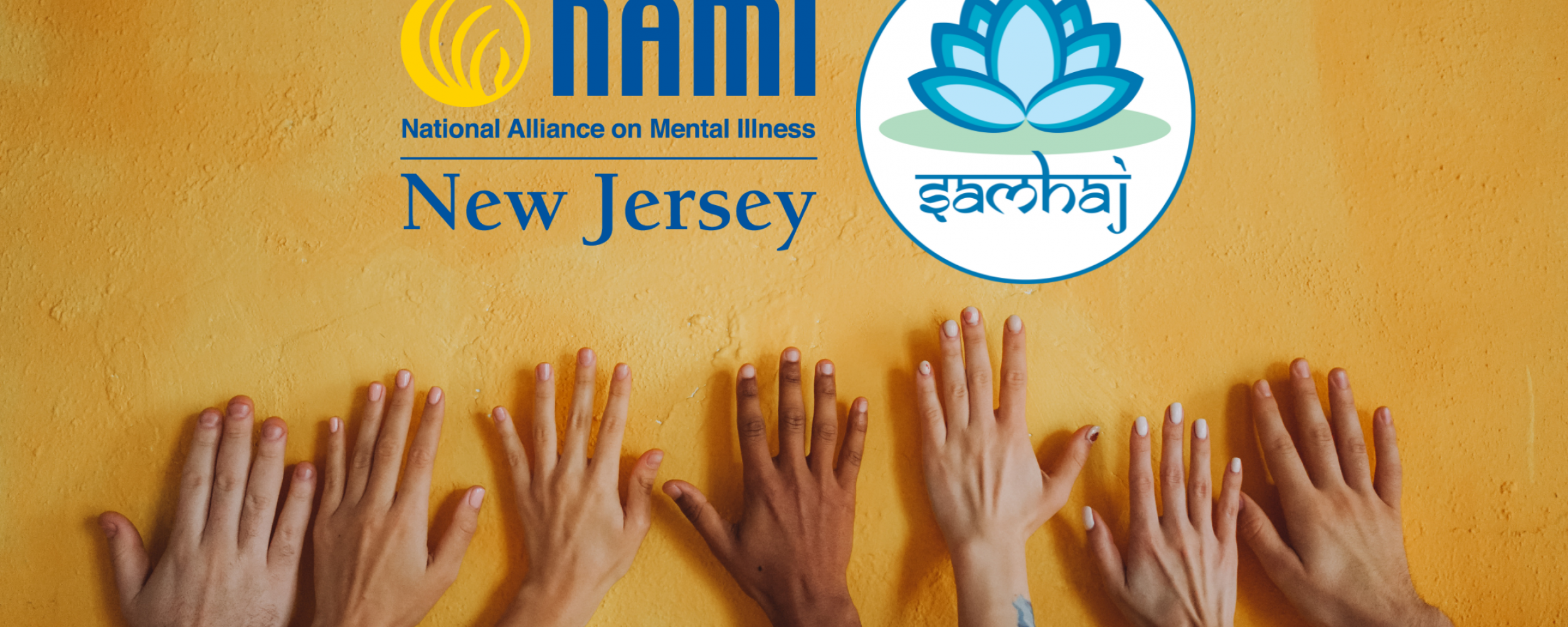 many hands of different shades of brown on a golden yellow painted stone wall with the NAMI NJ logo and SAMHAJ logo