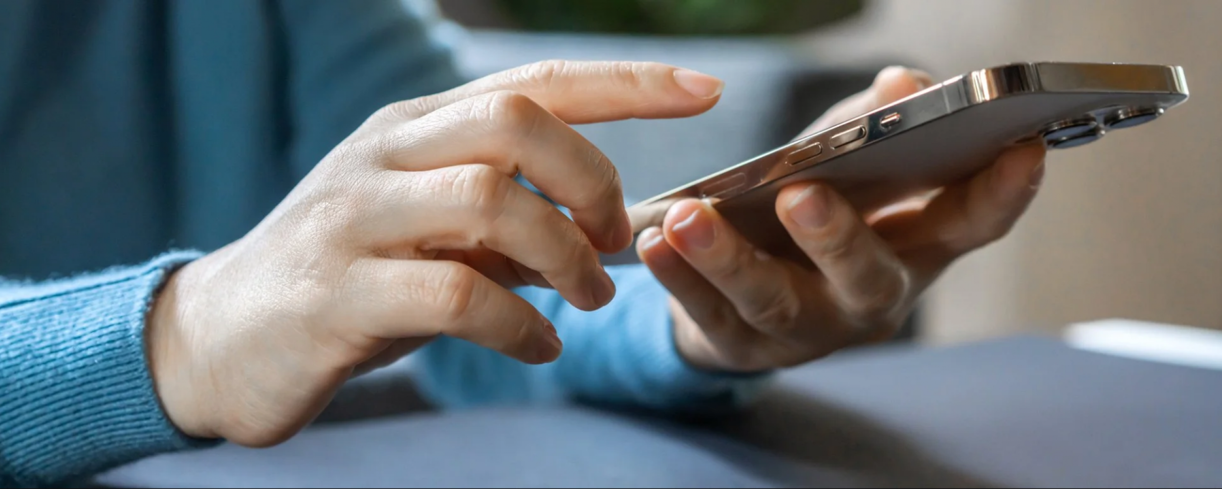 Person about to type on iPhone.