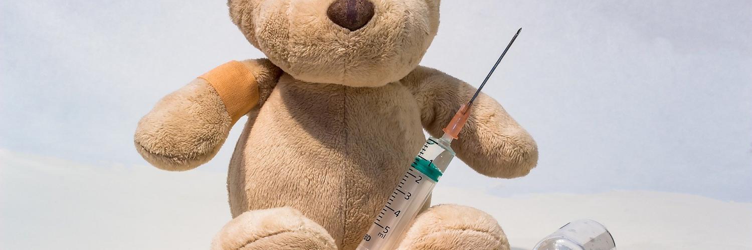 teddy bear with syringe