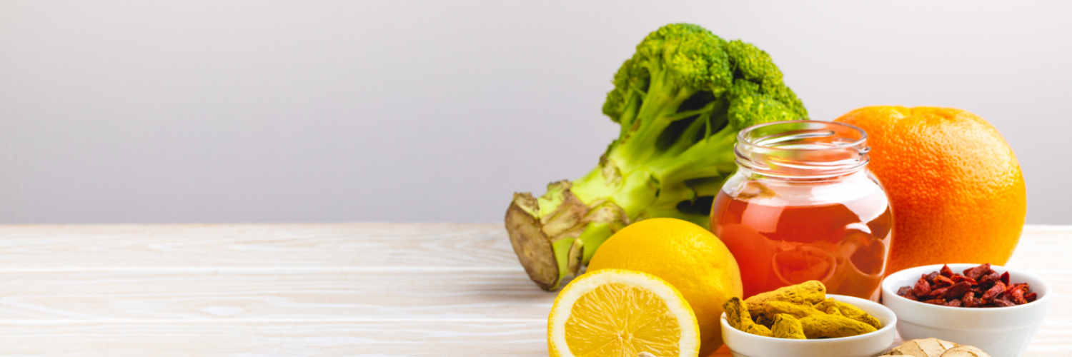 Image of broccoli, ginger, lemon, orange, garlic, and tumeric