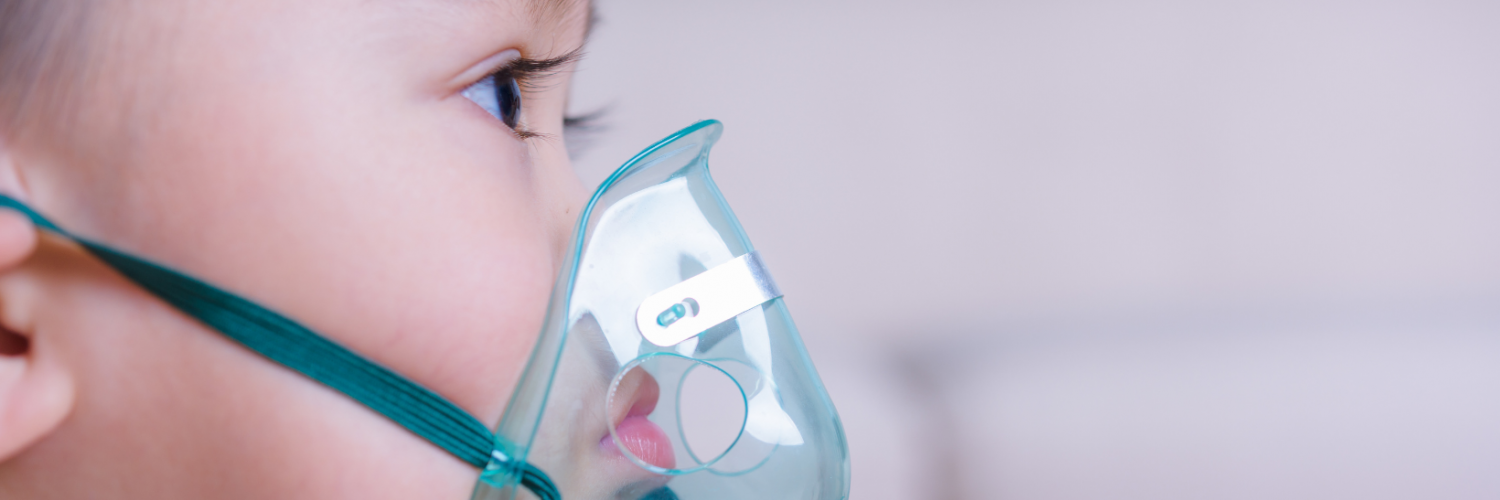 Child with oxygen mask