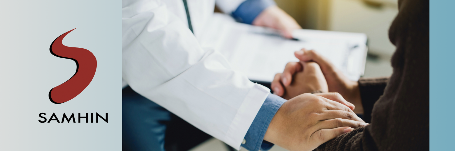 zoom in photo of a psychiatrist comforting a patient