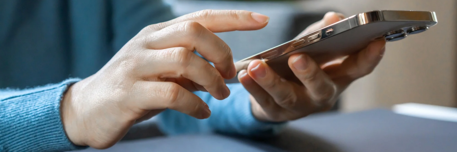 Person about to type on iPhone.